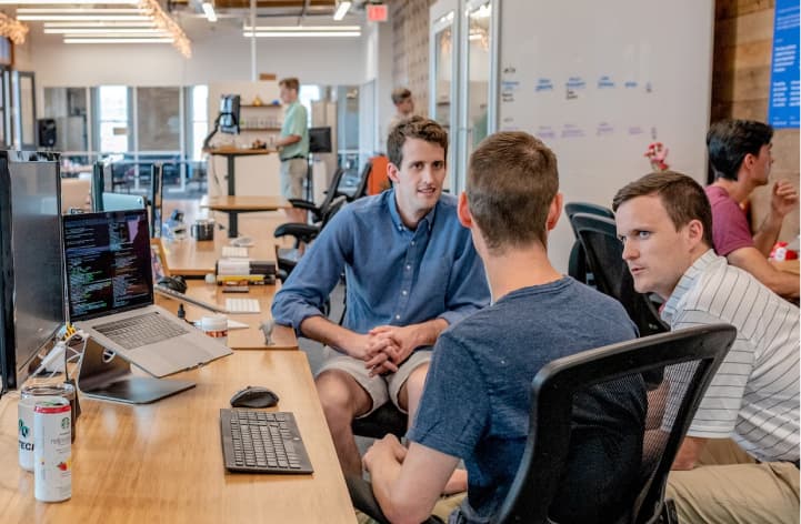 A group of coders working together